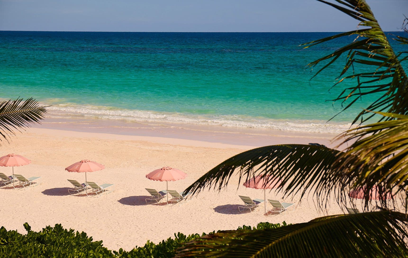 view of beach through the trees
