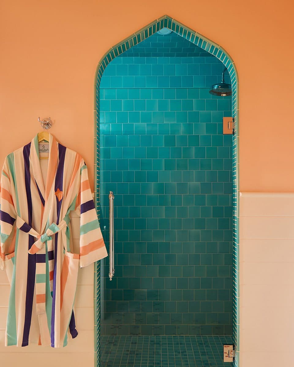 turquoise tile shower and robe