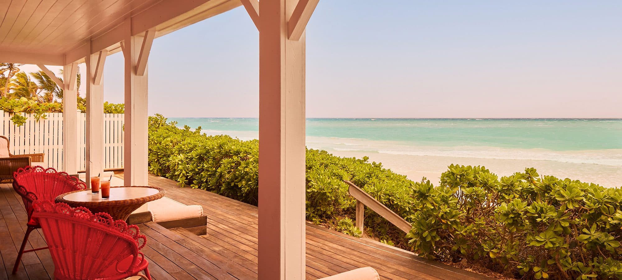 view of beach and ocean from porch