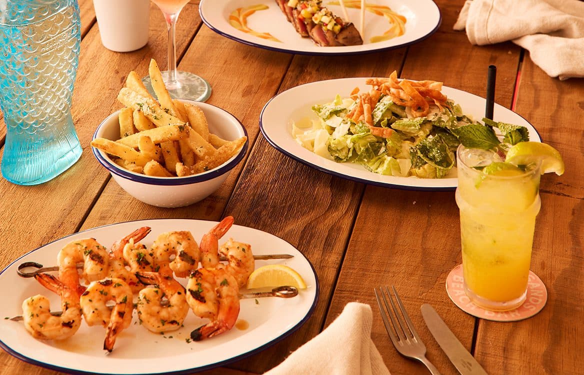 fries, shrimp, salad and cocktail